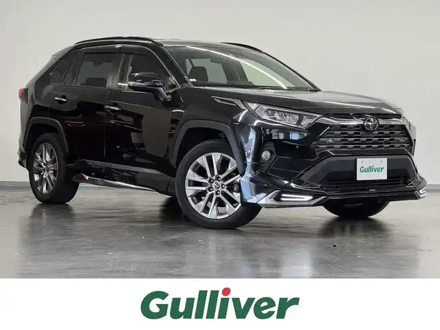 トヨタ ＲＡＶ４ G Zパッケージ 三重県 2020(令2)年 5.3万km アティチュードブラックマイカ ガソリン/フルタイム4WD/MTモード付インパネCVT/純正 9インチナビ NSZT-Y68T/（AM/FM/CD/DVD/TV/SD/SDREC/Bluetooth/USB/HDMI）/バックガイドモニター/モデリスタエアロ（F/S/R下）/ビルトイン ETC/Toyota Safety Sense/・プリクラッシュセーフティ［PCS］/・レーントレーシングアシスト［LTA］/・レーダークルコン/・オートハイビーム［AHB］/・インテリジェント クリアランスソナー（パーキングサポートブレーキ（静止物））/・リヤクロストライフィックオートブレーキ（PKSB（後方接近車両））＋ブラインドスポットモニター［BSM］/など/装備/・ハンズフリーパワーバックドア/・デジタルインナーミラー/・専用合皮シート（ブラック）/・シートヒーター（D/N）/・ステアリングヒーター/・パワーシート（Dメモリー付8way）/・左右独立オートエアコン/・オートライト/・LEDヘッドランプ/・フロントフォグランプ/・ステアリングスイッチ/・純正19inAW/・保/取/マルチ取/・スマートキーx2/など