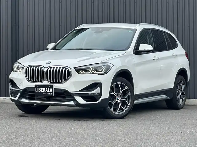ＢＭＷ Ｘ１ sDrive 18i Xライン 福島県 2021(令3)年 6.9万km アルピンホワイトⅢ 純正ナビ(BT/USB）/バックカメラ/アクティブクルーズコントロール/インテリジェントセーフティ/コンフォートアクセス/ミラー一体型ETC/茶レザーシート/シートヒーター/パワーシート/パワーバックドア/ステアリングスイッチ/アンビエントライト/LEDヘッドライト/純正18AW/純正17AW付スタッドレス積/取扱説明書/保証書/スペアキー