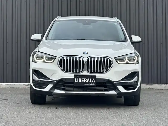 ＢＭＷ Ｘ１ sDrive 18i Xライン 福島県 2021(令3)年 6.9万km アルピンホワイトⅢ 純正ナビ(BT/USB）/バックカメラ/アクティブクルーズコントロール/インテリジェントセーフティ/コンフォートアクセス/ミラー一体型ETC/茶レザーシート/シートヒーター/パワーシート/パワーバックドア/ステアリングスイッチ/アンビエントライト/LEDヘッドライト/純正18AW/純正17AW付スタッドレス積/取扱説明書/保証書/スペアキー