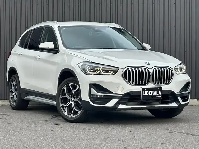 ＢＭＷ Ｘ１ sDrive 18i Xライン 福島県 2021(令3)年 6.9万km アルピンホワイトⅢ 純正ナビ(BT/USB）/バックカメラ/アクティブクルーズコントロール/インテリジェントセーフティ/コンフォートアクセス/ミラー一体型ETC/茶レザーシート/シートヒーター/パワーシート/パワーバックドア/ステアリングスイッチ/アンビエントライト/LEDヘッドライト/純正18AW/純正17AW付スタッドレス積/取扱説明書/保証書/スペアキー