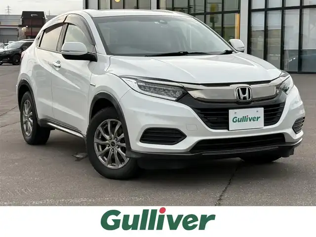 ホンダ ヴェゼル ハイブリッド ホンダセンシング 道南・函館 2020(令2)年 6.7万km プラチナホワイトパール 社外ナビ/ワンセグＴＶ/衝突軽減ブレーキ/エンジンスターター/クルーズコントロール/寒冷地仕様/ＥＴＣ/バックカメラ/レーンキープアシスト/オートライト/オートブレーキホールド/パドルシフト