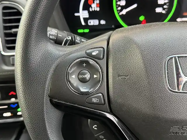 ホンダ ヴェゼル ハイブリッド ホンダセンシング 道南・函館 2020(令2)年 6.7万km プラチナホワイトパール 社外ナビ/ワンセグＴＶ/衝突軽減ブレーキ/エンジンスターター/クルーズコントロール/寒冷地仕様/ＥＴＣ/バックカメラ/レーンキープアシスト/オートライト/オートブレーキホールド/パドルシフト
