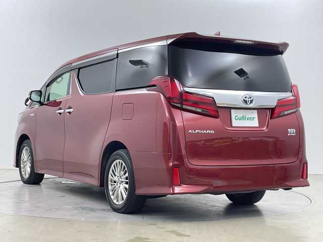 トヨタ アルファードハイブリット SR 道央・札幌 2020(令2)年 4.8万km ワイン ・４WD／ハイブリッド/・トヨタセーフティセンス/・プリクラッシュセーフティ/・レーダークルーズコントロール/・ブラインドスポットモニター/・純正ディスプレイ　ナビ付/・オプション　DVD.CD/・フルセグ/Bluetooth/Miracast/・バックカメラ /・純正フリップダウン モニター/・両側パワースライドドア/・パワーバックドア /・レザーシート/オットマンシート/・シートヒーター/ベンチレーション/・LEDライト/オートハイビーム/・クリアランスソナー/・ビルトインETC