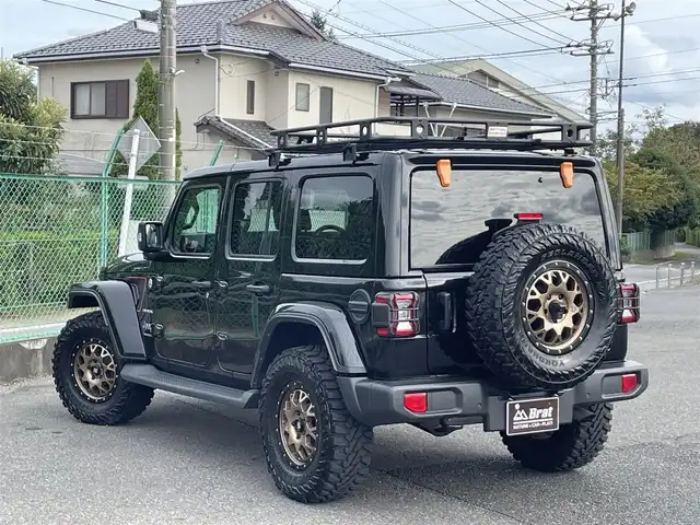 クライスラー・ジープ ジープ ラングラー アンリミテッド サハラ 千葉県 2023(令5)年 2.1万km ブラック ・ワンオーナー/・エクストリームJ アルミホイール/・ヨコハマ ジオランダーM/Tタイヤ/・Smittybilt製ルーフラック /・純正メーカーナビ/・フロント/サイド/リアカメラ/・アルパインスピーカー/・黒革シート/・前席シートヒーター/・ステアリングヒーター/・ETC2.0/・コーナーセンサー/・アダプティブクルコン/・BSM/・純正フロアマット/・115V電源