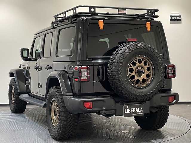 クライスラー・ジープ ジープ ラングラー アンリミテッド サハラ 新潟県 2023(令5)年 2.1万km ブラック 社外装備品/・エクストリームJ 17インチアルミホイール/・ヨコハマ ジオランダーM/Tタイヤ/・Smittybilt製ルーフラック /標準装備品/・純正ナビUconnect/8.4インチVGAタッチパネルモニター（AM/FMラジオ/フルセグ/Bluetooth/AUX/Apple CarPlay / Android Auto）/・フロント/サイド/リアカメラ/・サブウーハー付アルパイン製プレミアムスピーカー（9基）/・アダクティブクルーズコントロール（STOP機能付）/・ParkSenseフロント・リアパークアシスト　/・レザーシート/・フロントシートヒーター/・ステアリングヒーター/・ETC（DSRC）/・LEDライト（ヘッドライト、フロントフォグランプ、 テールランプ）/・115V アクセサリー電源アウトレット