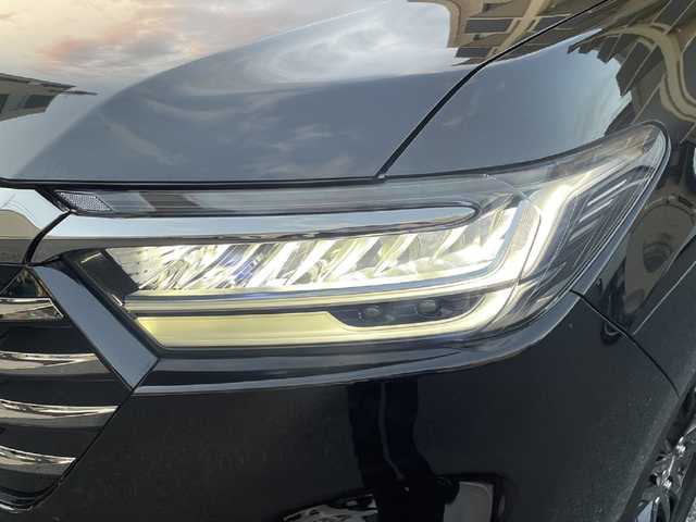 ホンダ オデッセイ アブソルート EX 広島県 2021(令3)年 2.8万km プレミアムスパークルブラックパール /登録時走行距離/　　　　　　　27495キロ/ワンオーナー/ナビ装着用スペシャルパッケージ/マルチビューカメラシステム/Hondaスマートパーキングアシスト/ブラインドスポットインフォメーション/2列目プレミアムクレードルシート/運転席＆助手席シートヒーター/助手席4ウェイパワーシート/運転席大型アームレスト/コンビシート/2列目LEDアンビエントランプ/ハンズフリーアクセスパワーテールゲート/18インチアルミホイール/スペアキー×１/新車時整備手帳/　　【保証書】/取扱説明書/