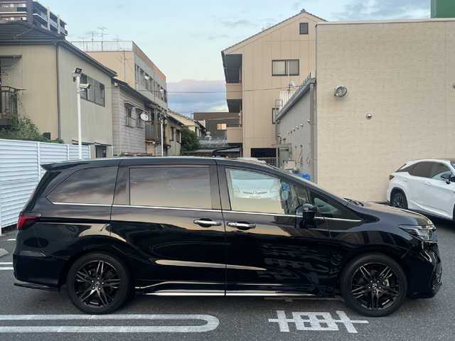 ホンダ オデッセイ アブソルート EX 広島県 2021(令3)年 2.8万km プレミアムスパークルブラックパール /登録時走行距離/　　　　　　　27495キロ/ワンオーナー/ナビ装着用スペシャルパッケージ/マルチビューカメラシステム/Hondaスマートパーキングアシスト/ブラインドスポットインフォメーション/2列目プレミアムクレードルシート/運転席＆助手席シートヒーター/助手席4ウェイパワーシート/運転席大型アームレスト/コンビシート/2列目LEDアンビエントランプ/ハンズフリーアクセスパワーテールゲート/18インチアルミホイール/スペアキー×１/新車時整備手帳/　　【保証書】/取扱説明書/