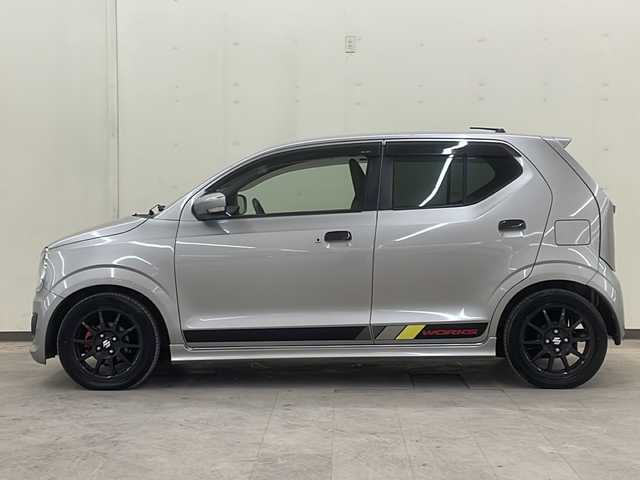 スズキ アルト ワークス 道央・札幌 2015(平27)年 4.8万km スチールシルバーM /4WD//5MT//社外オーディオ//電動格納ミラー//BLITZ フロントタワーバー//G-monsterインタークーラーカバー//フジツボ マフラー//革調シートカバー//社外AW冬タイヤ積み込み