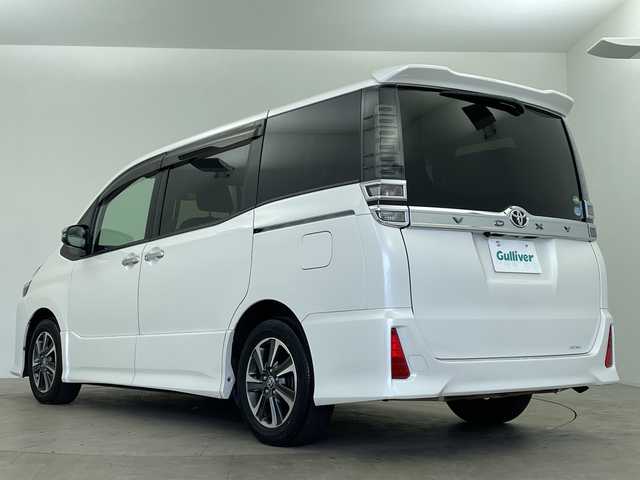 トヨタ ヴォクシー ZS 煌 鹿児島県 2019(平31)年 7.5万km ホワイトパールクリスタルシャイン 純正ナビ　/’フルセグ/Bluetooth/CD/DVD/AM/FM)　/フリップダウンモニター　/バックカメラ　/ドライブレコーダー　/クルーズコントロール　/オートハイビーム　/オートライト　/両側パワースライドドア　/レーンキープアシスト　/ＥＴＣ　/ＵＳＢ入力端子/プッシュスタートボタン/スマートキー
