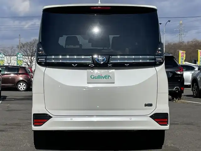 トヨタ ヴォクシー ハイブリッド S－G 道央・札幌 2025(令7)年 1.3万km ホワイトパールクリスタルシャイン ４WD/寒冷地仕様/純正ディスプレイオーディオ（ナビ付）/AM/FM/BT/トヨタセーフティセンス/プリクラッシュセーフティ/横滑り防止装置/レーダークルーズコントロール/レーンキープアシスト/クリアランスソナー/プロアクティブドライビングアシスト/パーキングサポートブレーキ/ロードサインアシスト/バックカメラ/ビルトインETC2.0/EVMODE/DRIVEMODE切替/ワイパーデアイサー/片側パワースライドドア/革巻きステアリング/ステアリングリモコン/プッシュスタート/スマートキー/LEDヘッドライト/オートライト/オートハイビーム/ヘッドライトレベライザー/電動格納ミラー/ウィンカーミラー/フロアマット/レンタカー登録