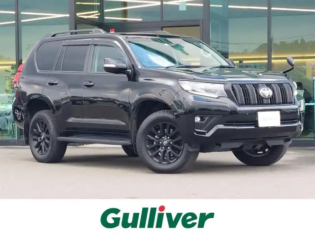 トヨタ ランドクルーザー プラド TX Lパッケージ マットブラED 東京都 2023(令5)年 1.8万km ブラック ワンオーナー/サンルーフ/ルーフレール/ヒッチメンバー/Toyota Safety Sense/・プリクラッシュセーフティ/・レーントレーシングアシスト/・レーンディパーチャーアラート/・先行車発進告知機能/・オートマチックハイビーム/・レーダークルーズコントロール/・クリアランスソナー/・ロードサインアシスト/プッシュスタート/MTモード付きAT/純正ナビ/フルセグTV/フロント＆バックカメラ/ETC2.0/前後ドライブレコーダー/レザーシート/パワーシート/シートヒーター/ベンチレーション/３列目電動格納シート/LEDヘッドライト/ドアバイザー/18インチ純正アルミホイール/スマートキー