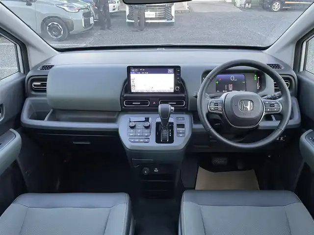 ホンダ フリード ハイブリット e:HEV クロスター 埼玉県 2025(令7)年 0.1千km プラチナホワイトパール 登録済未使用車/純正９型ナビTV/バックカメラ/シートヒーター/両側パワースライドドア/クリアランスソナー/LEDヘッドライト/専用純正アルミホイール/レーダークルーズコントロール/衝突軽減ブレーキ/BSM/走行２６キロ/プッシュスタート/スマートキー/保証書付整備手帳/取扱説明書