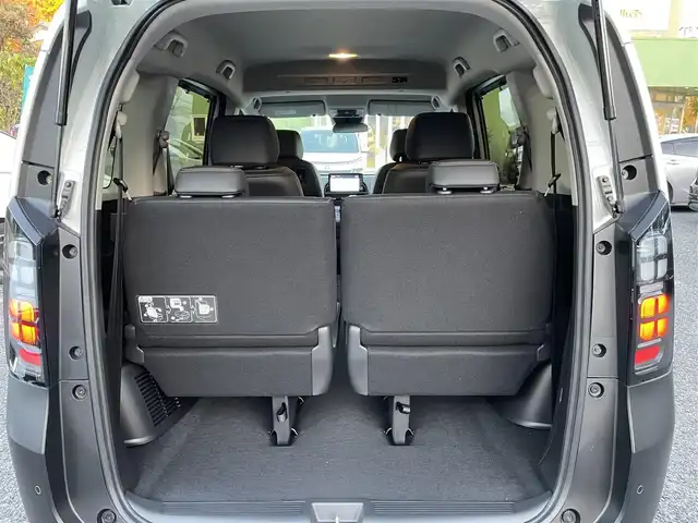 ホンダ フリード ハイブリット e:HEV クロスター 埼玉県 2025(令7)年 0.1千km プラチナホワイトパール 登録済未使用車/純正９型ナビTV/バックカメラ/シートヒーター/両側パワースライドドア/クリアランスソナー/LEDヘッドライト/専用純正アルミホイール/レーダークルーズコントロール/衝突軽減ブレーキ/BSM/走行２６キロ/プッシュスタート/スマートキー/保証書付整備手帳/取扱説明書