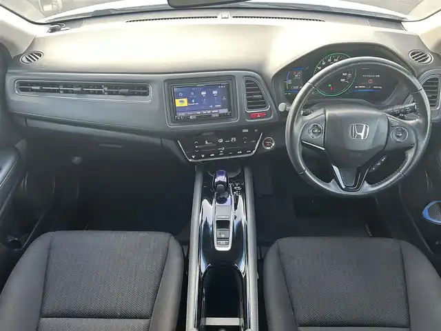 ホンダ ヴェゼル ハイブリッド X 岡山県 2014(平26)年 9.3万km ホワイトオーキッドパール 登録時走行距離92515km/カロッツェリアナビ/フルセグTV(AM.FM.CD.DVD.TV.BT)/バックカメラ/ETC/衝突軽減ブレーキ/横滑り防止装置/クルーズコントロール/オートライト/アイドリングストップ/16インチ純正AW/純正フロアマット/スマートキー/ドアバイザー