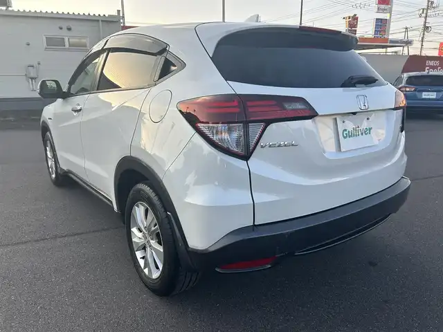 ホンダ ヴェゼル ハイブリッド X 岡山県 2014(平26)年 9.3万km ホワイトオーキッドパール 登録時走行距離92515km/カロッツェリアナビ/フルセグTV(AM.FM.CD.DVD.TV.BT)/バックカメラ/ETC/衝突軽減ブレーキ/横滑り防止装置/クルーズコントロール/オートライト/アイドリングストップ/16インチ純正AW/純正フロアマット/スマートキー/ドアバイザー