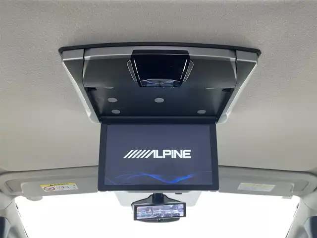 日産 セレナ ハイウェイスター V Vセレクション 大分県 2024(令6)年 1.9万km プリズムホワイト プロパイロット/社外SDナビ/（フルセグ/CD/DVD/Bluetooth）/アルパインフリップダウンモニター/アラウンドビューモニター/オートハイービーム/ETC/両側パワースライドドア/オートブレーキホールド/電動パーキングブレーキ/デジタルインナーミラー/パドルシフト/スマートキー・プッシュスタート/純正アルミホイール　