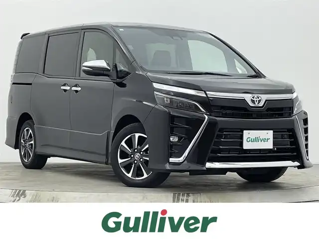 トヨタ ヴォクシー ZS 煌Ⅲ 宮城県 2021(令3)年 0.9万km ブラック パイオニアナビＴＶ/両側電動スライドドア/ハーフレザーシート/バックモニター/ETC/クルーズコントロール/クリアランスソナー/LEDヘッドランプ/プリクラッシュセーフティ/レーンディパーチャーアラート/オートマチックハイビーム/後席オートエアコン/リアサンシェード/ドライブレコーダー/純正16インチアルミ/禁煙車