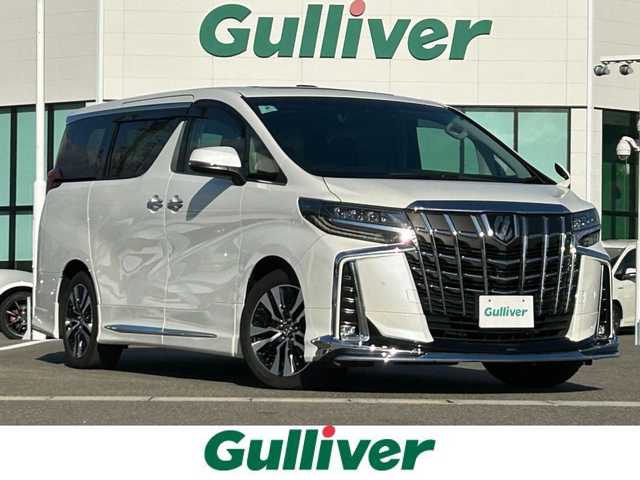トヨタ アルファード S Cパッケージ 佐賀県 2019(平31)年 6.9万km ホワイトパールクリスタルシャイン ワンオーナー/ツインムーンルーフ/モデリスタエアロ/社外10インチメモリーナビゲーション/・フルセグTV/CD/DVD/SD/USB/Bluetooth/社外11.6インチフリップダウンモニター/バックカメラ/前方ドライブレコーダー/ビルトインETC/デジタルインナーミラー/パワーバックドア/電子パーキングブレーキ/・AUTO HOLD機能/レザーシート(合皮)/DN席＋2列目パワーシート(D席メモリー機能付)/DN席シートヒーター/シートベンチレーション/N席＋2列目電動オットマン/ISOFIX対応/木目調革巻きステアリング/ステアリングヒーター/ステアリングリモコン/純正18インチアルミホイール/純正三眼LEDヘッドライト/・オートマチックハイビーム/純正LEDフォグランプ/純正ドアバイザ―/新車保証書/取扱説明書/スペアキー１本/トヨタセーフティセンス/・レーダークルーズコントロール/・レーントレーシングアシスト/・プリクラッシュセーフティ/・ブラインドスポットモニター/・クリアランスソナー/・パーキングサポートブレーキ/・ロードサインアシスト