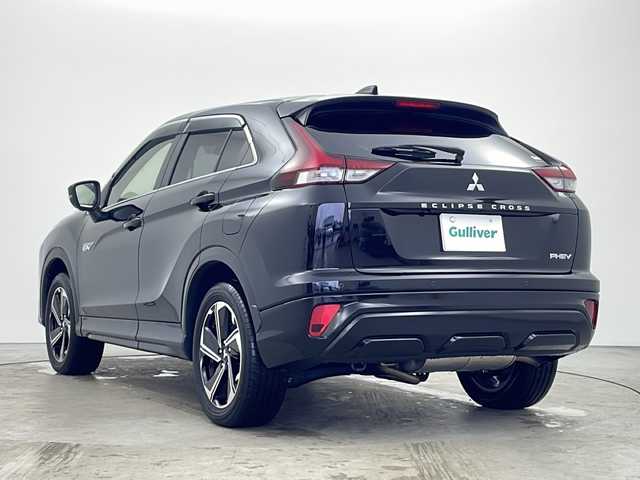 三菱 エクリプス クロス ＰＨＥＶ P 秋田県 2021(令3)年 2.7万km アメジストブラック ４WD/１００V（AC)/純正メモリナビ/TV（フルセグ）/全方位カメラ/三菱e-アシスト/　・衝突被害軽減ブレーキシステム(FCM)/　・車線逸脱警報システム(LDW)/　・レーダークルーズコント　ロール(ACC)/　・オートマチックハイビーム(AHB)/　・誤発進抑制機能(前進＆後退)/　・後側方車両検知警報システム(BSW/LCA)/　・後退時車両検知警報システム(RCTA)/D席パワーシート/シートヒーター/充電ケーブル/スマートキー/ヘッドアップディスプレイ/ステアリングヒーター/純正フロアマット/純正アルミホイール/エアロパーツ（リア）/ABS/横滑防止装置/オートライト（ハイビーム）/ETC/ステアリングリモコン/ドアバイザー