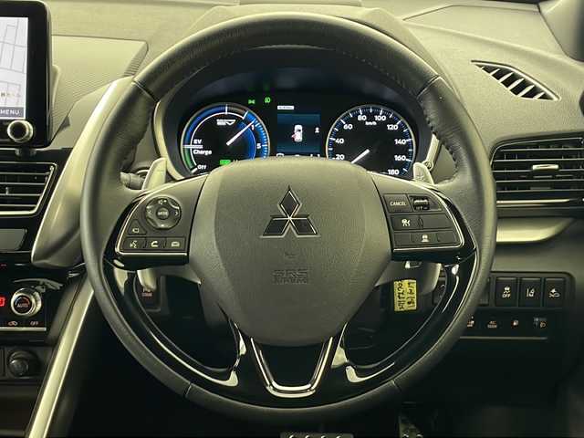 三菱 エクリプス クロス ＰＨＥＶ P 秋田県 2021(令3)年 2.7万km アメジストブラック ４WD/１００V（AC)/純正メモリナビ/TV（フルセグ）/全方位カメラ/三菱e-アシスト/　・衝突被害軽減ブレーキシステム(FCM)/　・車線逸脱警報システム(LDW)/　・レーダークルーズコント　ロール(ACC)/　・オートマチックハイビーム(AHB)/　・誤発進抑制機能(前進＆後退)/　・後側方車両検知警報システム(BSW/LCA)/　・後退時車両検知警報システム(RCTA)/D席パワーシート/シートヒーター/充電ケーブル/スマートキー/ヘッドアップディスプレイ/ステアリングヒーター/純正フロアマット/純正アルミホイール/エアロパーツ（リア）/ABS/横滑防止装置/オートライト（ハイビーム）/ETC/ステアリングリモコン/ドアバイザー