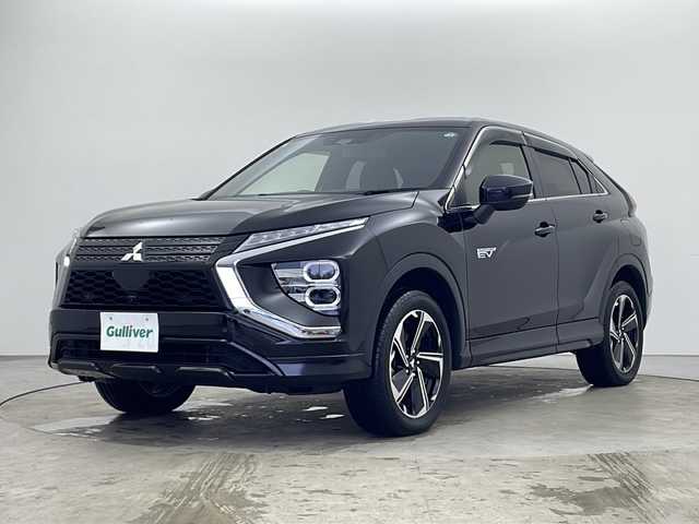 三菱 エクリプス クロス ＰＨＥＶ P 秋田県 2021(令3)年 2.7万km アメジストブラック ４WD/１００V（AC)/純正メモリナビ/TV（フルセグ）/全方位カメラ/三菱e-アシスト/　・衝突被害軽減ブレーキシステム(FCM)/　・車線逸脱警報システム(LDW)/　・レーダークルーズコント　ロール(ACC)/　・オートマチックハイビーム(AHB)/　・誤発進抑制機能(前進＆後退)/　・後側方車両検知警報システム(BSW/LCA)/　・後退時車両検知警報システム(RCTA)/D席パワーシート/シートヒーター/充電ケーブル/スマートキー/ヘッドアップディスプレイ/ステアリングヒーター/純正フロアマット/純正アルミホイール/エアロパーツ（リア）/ABS/横滑防止装置/オートライト（ハイビーム）/ETC/ステアリングリモコン/ドアバイザー