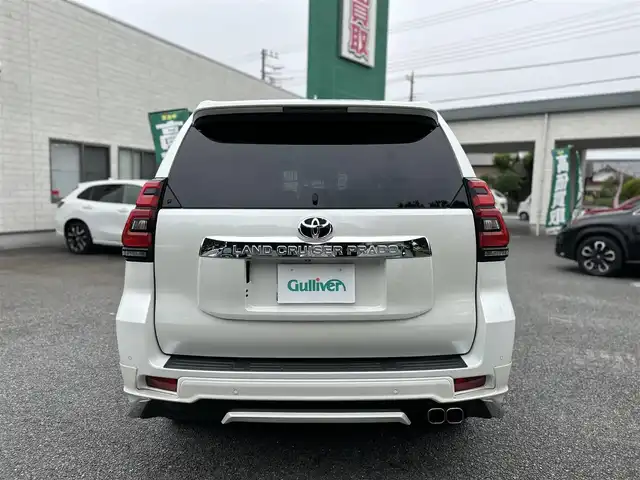 トヨタ ランドクルーザー プラド TX Lパッケージ 東京都 2019(平31)年 2.1万km ホワイトパールクリスタルシャイン ワンオーナー/メーカーオプションナビ（8インチ）/・Bluetoothオーディオ/USBオーディオ/・DVD/Blu-ray/フルセグTV/マルチテレインモニター/電動ムーンルーフ/純正19インチアルミホイール/クリアランスソナー&バックソナー/木目調・本革巻きステアリングホイール/Toyota Safety Sense/ビルトインETC2.0/取扱説明書/保証書/スペアキー1本