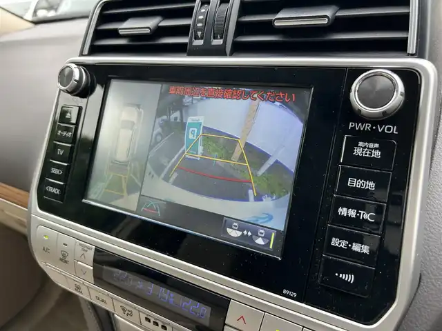 トヨタ ランドクルーザー プラド TX Lパッケージ 東京都 2019(平31)年 2.1万km ホワイトパールクリスタルシャイン ワンオーナー/メーカーオプションナビ（8インチ）/・Bluetoothオーディオ/USBオーディオ/・DVD/Blu-ray/フルセグTV/マルチテレインモニター/電動ムーンルーフ/純正19インチアルミホイール/クリアランスソナー&バックソナー/木目調・本革巻きステアリングホイール/Toyota Safety Sense/ビルトインETC2.0/取扱説明書/保証書/スペアキー1本