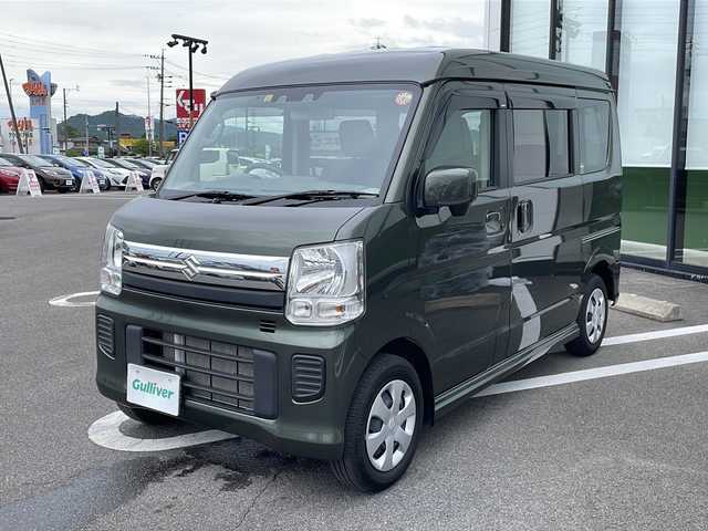 スズキ エブリィ ワゴン JPターボ 岐阜県 2023(令5)年 0.5万km クールカーキPM 登録時走行距離4174km/７Ｖ型ワイドＳＤナビ　/コーナーセンサー前後　/シートヒーター運転席　/両側スライドドア　/プッシュスタート/パワーステアリング/パワーウィンドウ/アイドリングストップ/エアコンAAC/Blue tooth接続/CD・DVD可/iPod接続/SDミュージックサーバー/USB入力端子/ベンチシート/フルフラットシート/ABS/横滑り防止装置/レーンキープアシスト/オートライト/ハロゲンヘッドライト/エアバッグW/衝突被害軽減システム/ドアバイザー