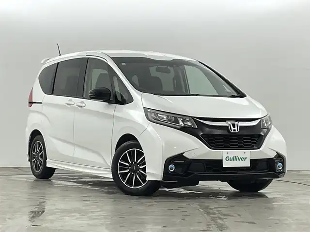 ホンダ フリード モデューロX ホンダセンシング 福島県 2018(平30)年 6.4万km ホワイトオーキッドパール ホンダセンシング　/・CMBS/・車線逸脱警報/・ACC/・レーンアシスト/・歩行者事故低減ステアリング/純正SDナビゲーション/【AM/FM/DVD/CD/Bluetooth/フルセグ】/型番:VXM-187VFNI　/バックカメラ　/ドライブレコーダー　/両側パワースライドドア　/純正フリップダウンモニター　/ハーフレザーシート/プッシュスタート　/・スマートキー　/・スペアキー　/オートライト　/・ＬＥＤライト　/・フォグライト/ステアリングスイッチ/・革巻きステアリング/・チルトステアリング/ETC/ウィンカーミラー