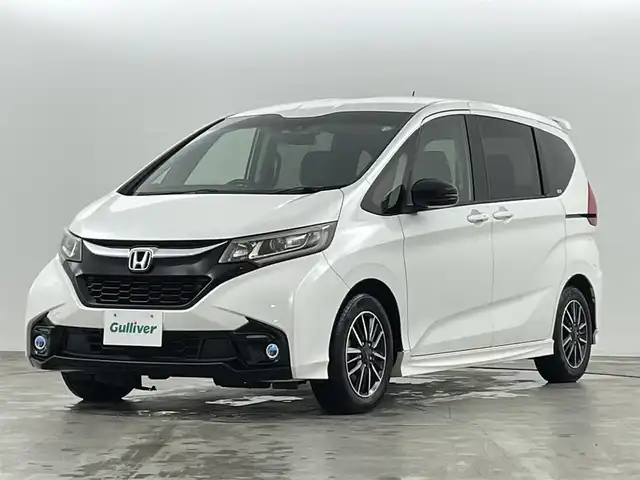 ホンダ フリード モデューロX ホンダセンシング 福島県 2018(平30)年 6.4万km ホワイトオーキッドパール ホンダセンシング　/・CMBS/・車線逸脱警報/・ACC/・レーンアシスト/・歩行者事故低減ステアリング/純正SDナビゲーション/【AM/FM/DVD/CD/Bluetooth/フルセグ】/型番:VXM-187VFNI　/バックカメラ　/ドライブレコーダー　/両側パワースライドドア　/純正フリップダウンモニター　/ハーフレザーシート/プッシュスタート　/・スマートキー　/・スペアキー　/オートライト　/・ＬＥＤライト　/・フォグライト/ステアリングスイッチ/・革巻きステアリング/・チルトステアリング/ETC/ウィンカーミラー
