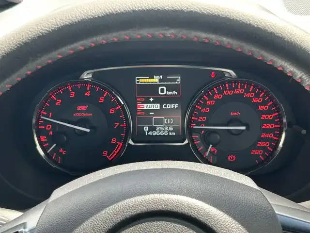 スバル ＷＲＸ ＳＴＩ STI 滋賀県 2015(平27)年 15万km ダークグレーメタリック 4WD(F4)/HKSサスペンション（Spec-A）/7インチ純正ナビ【AVIC-ZH0999】/（FM/AM/CD/DVD/Bluetooth/HDMI/フルセグTV）/バックカメラ/サイドカメラ/ETC/GPSレーダー/デジタルインナーミラー(前後ドラレコ機能付き)/アドバンスドセーフティパッケージ/・リヤビークルディティクション/・サイドビューモニター/・ハイビームアシスト/電動格納ミラー/革巻きステアリング/ステアリングスイッチ/オートライト/LEDヘッドライト/フロントフォグ/リアフォグ/フルオートエアコン/プッシュスタート/スマートキー/純正フロアマット