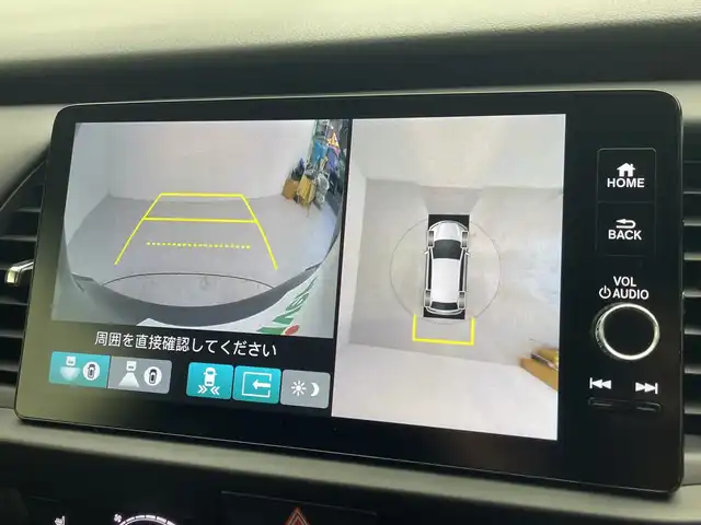 ホンダ フィット e:HEVリュクス 愛知県 2025(令7)年 0.4万km メテオロイドグレーメタリック 純正ナビ/・フルセグ/・Bluetooth/・AppleCarPlay/・AndroidAuto/・AM/FM/アラウンドビューモニター/追従クルコン/ビルドインＥＴＣ2.0/前席シートヒータ/衝突軽減ブレーキ/ブラインドスポットモニター/レーンキープアシスト/ステアリングヒーター/衝突軽減ブレーキ（CMBS）/誤発進抑制機能/歩行者事故低減ステアリング/路外逸脱抑制機能/渋滞追従機能付きアダプティブクルーズコントロール（ACC）/車線維持支援システム（LKAS）/先行車発進お知らせ機能/標識認識機能/オートハイビーム/ワイヤレス充電/電動パーキングブレーキ/オートホールド/LEDヘッドライト