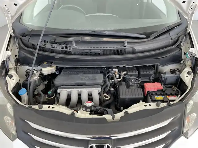 ホンダ フリード G ジャストセレクション 大分県 2011(平23)年 13.1万km プレミアムホワイトパール 社外メモリーナビ/（フルセグ/CD/DVD/Bluetooth）/バックカメラ/片側パワースライドドア/ETC/電動格納ミラー/オートライト/フロアマット