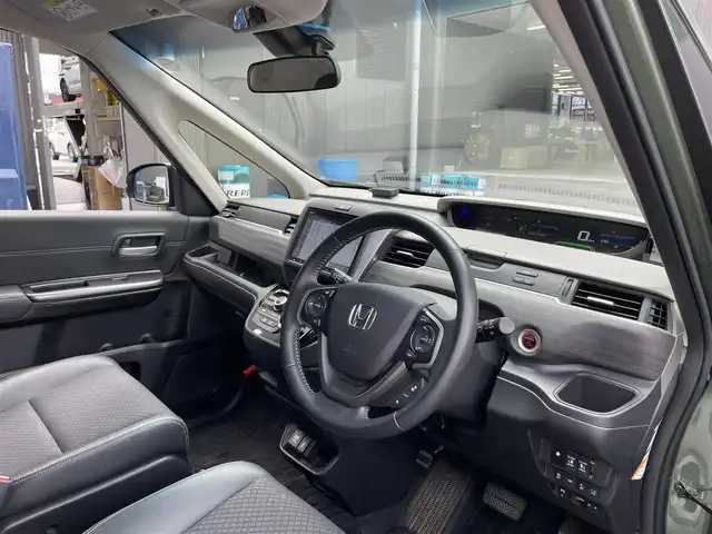 ホンダ フリード ハイブリット G ホンダセンシング 滋賀県 2020(令2)年 7.3万km シルバーミストグリーンM 社外9インチナビ/【Bluetooth/CD/DVD/フルセグTV】/両側パワースライドドア/ホンダセンシング/バックカメラ/追従クルーズコントロール/レーンキープアシスト/リアソナー/衝突軽減ブレーキ/LEDヘッドライト/オートライト/ハーフレザーシート/D/Nシートヒーター/ビルトインETC/プッシュスタート/スマートキー/ステアリングリモコン
