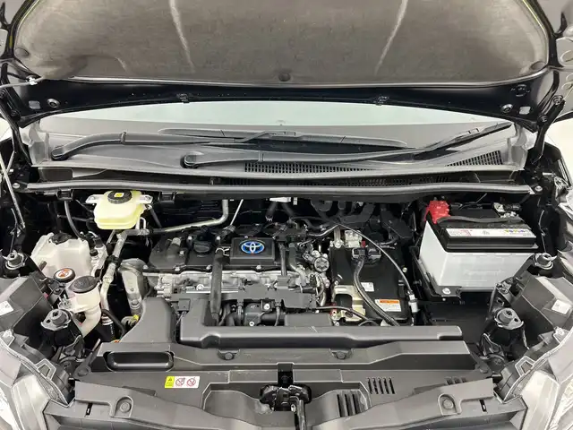 トヨタ ノア ハイブリッド S－Z 愛知県 2023(令5)年 2.8万km アティチュードブラックマイカ 禁煙車/純正10.5インチナビ/（CD/DVD/Bluetooth/フルセグTV/USB/HDMI)/バックカメラ/フリップダウンモニター/AC100V電源/トヨタセーフティセンス/・プリクラッシュセーフティ/・レーントレーシングアシスト/・レーンディパーチャーアラート/・レーダークルーズコントロール/・オートマチックハイビーム/・ロードサインアシスト/・プロアクティブドライビングアシス/・発進遅れ告知機能：先行車・信号出遅れ防止をサポート/・緊急時操舵支援/・フロントクロストラフィックアラート/ETC2.0/シートヒーター/ハーフレザーシート/両側パワースライドドア/純正17インチアルミホイール/スマートキー/プッシュスタート/LEDヘッドライト/フロントフォグランプ/オートライト/純正フロアマット/横滑り防止装置/電子パーキングブレーキ/オートホールド