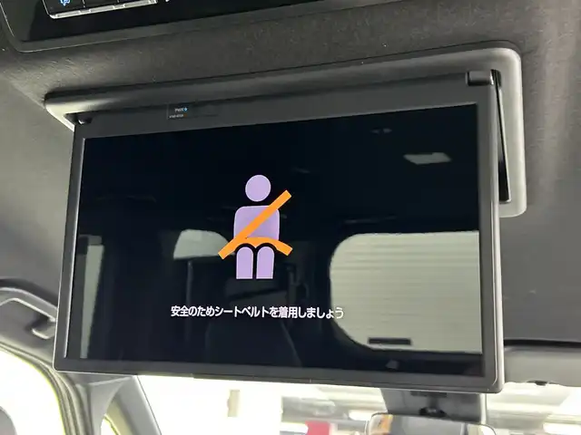 トヨタ ノア ハイブリッド S－Z 愛知県 2023(令5)年 2.8万km アティチュードブラックマイカ 禁煙車/純正10.5インチナビ/（CD/DVD/Bluetooth/フルセグTV/USB/HDMI)/バックカメラ/フリップダウンモニター/AC100V電源/トヨタセーフティセンス/・プリクラッシュセーフティ/・レーントレーシングアシスト/・レーンディパーチャーアラート/・レーダークルーズコントロール/・オートマチックハイビーム/・ロードサインアシスト/・プロアクティブドライビングアシス/・発進遅れ告知機能：先行車・信号出遅れ防止をサポート/・緊急時操舵支援/・フロントクロストラフィックアラート/ETC2.0/シートヒーター/ハーフレザーシート/両側パワースライドドア/純正17インチアルミホイール/スマートキー/プッシュスタート/LEDヘッドライト/フロントフォグランプ/オートライト/純正フロアマット/横滑り防止装置/電子パーキングブレーキ/オートホールド