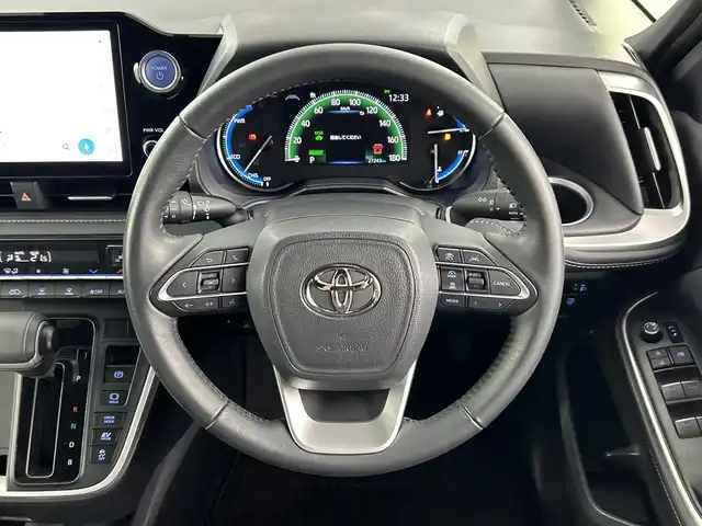 トヨタ ノア ハイブリッド S－Z 愛知県 2023(令5)年 2.8万km アティチュードブラックマイカ 禁煙車/純正10.5インチナビ/（CD/DVD/Bluetooth/フルセグTV/USB/HDMI)/バックカメラ/フリップダウンモニター/AC100V電源/トヨタセーフティセンス/・プリクラッシュセーフティ/・レーントレーシングアシスト/・レーンディパーチャーアラート/・レーダークルーズコントロール/・オートマチックハイビーム/・ロードサインアシスト/・プロアクティブドライビングアシス/・発進遅れ告知機能：先行車・信号出遅れ防止をサポート/・緊急時操舵支援/・フロントクロストラフィックアラート/ETC2.0/シートヒーター/ハーフレザーシート/両側パワースライドドア/純正17インチアルミホイール/スマートキー/プッシュスタート/LEDヘッドライト/フロントフォグランプ/オートライト/純正フロアマット/横滑り防止装置/電子パーキングブレーキ/オートホールド