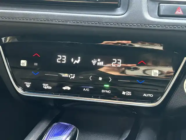 ホンダ ヴェゼル ハイブリッド Z ホンダセンシング 滋賀県 2017(平29)年 7万km モルフォブルーP 純正7インチナビ/【Bluetooth/CD/DVD/フルセグTV/USB】/ハーフレザーシート/バックカメラ/追従クルーズコントロール/LEDヘッドライト/オートマチックハイビーム/衝突被害軽減ブレーキ/リアソナー/D/Nパワーシート/D/Nシートヒーター/ビルトインETC/電動パーキングブレーキ/オートブレーキホールド/プッシュスタート/スマートキー/ステアリングリモコン