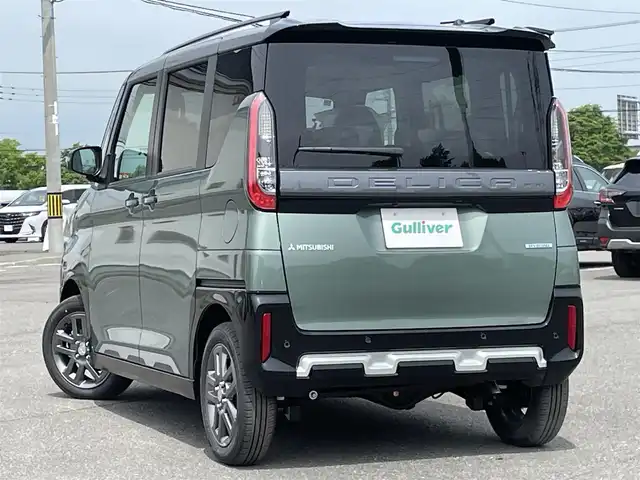 三菱 デリカミニ T プレミアム 道央・札幌 2025(令7)年 0.1万km未満 緑Ｍ ４WD/ワンオーナー/純正ディスプレイオーディオ/AM/FM/BT/MI-PILOT/衝突被害軽減ブレーキ/横滑り防止装置/レーダークルーズコントロール/ダウンヒルアシストコントロール/レーンキープアシスト/クリアランスソナー/マルチアラウンドモニター/デジタルインナーミラー/アイドリングストップ/両側パワースライドドア/前席シートヒーター/ハーフレザーシート/革巻きステアリング/ステアリングリモコン/パドルシフト/ハンドルヒーター/電動パーキング/オートブレーキホールド/プッシュスタート/スマートキー/LEDヘッドライト/オートライト/フォグランプ/ヘッドライトレベライザー/電動格納ミラー/ウィンカーミラー/スペアキー