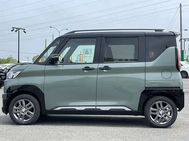 三菱 デリカミニ T プレミアム 道央・札幌 2025(令7)年 0.1万km未満 緑Ｍ ４WD/ワンオーナー/純正ディスプレイオーディオ/AM/FM/BT/MI-PILOT/衝突被害軽減ブレーキ/横滑り防止装置/レーダークルーズコントロール/ダウンヒルアシストコントロール/レーンキープアシスト/クリアランスソナー/マルチアラウンドモニター/デジタルインナーミラー/アイドリングストップ/両側パワースライドドア/前席シートヒーター/ハーフレザーシート/革巻きステアリング/ステアリングリモコン/パドルシフト/ハンドルヒーター/電動パーキング/オートブレーキホールド/プッシュスタート/スマートキー/LEDヘッドライト/オートライト/フォグランプ/ヘッドライトレベライザー/電動格納ミラー/ウィンカーミラー/スペアキー