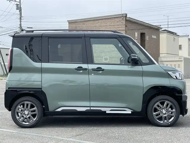三菱 デリカミニ T プレミアム 道央・札幌 2025(令7)年 0.1万km未満 緑Ｍ ４WD/ワンオーナー/純正ディスプレイオーディオ/AM/FM/BT/MI-PILOT/衝突被害軽減ブレーキ/横滑り防止装置/レーダークルーズコントロール/ダウンヒルアシストコントロール/レーンキープアシスト/クリアランスソナー/マルチアラウンドモニター/デジタルインナーミラー/アイドリングストップ/両側パワースライドドア/前席シートヒーター/ハーフレザーシート/革巻きステアリング/ステアリングリモコン/パドルシフト/ハンドルヒーター/電動パーキング/オートブレーキホールド/プッシュスタート/スマートキー/LEDヘッドライト/オートライト/フォグランプ/ヘッドライトレベライザー/電動格納ミラー/ウィンカーミラー/スペアキー