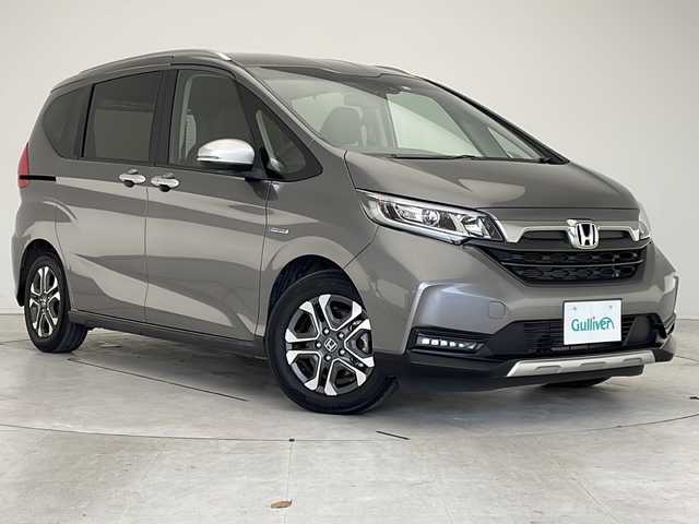 ホンダ フリード＋ ハイブリット クロスター ホンダセンシング 愛知県 2022(令4)年 2.6万km スーパープラチナグレーメタリック 衝突軽減システム/純正９型SDナビ/両側パワースライドドア/クルーズコントロール/シートヒーター/フルセグ/CD/DVD/Bluetooth/バックカメラ/コーナーセンサー/純正アルミホイール/コーナーセンサー/ルーフレール/LEDヘッドライト/ETC/ステアリングスイッチ/スマートキー/プッシュスタート