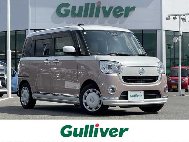 ダイハツ ムーヴ キャンバス G メイクアップ SA Ⅲ 佐賀県 2018(平30)年 2.7万km パールホワイトⅢ/ライトローズマイカメタリックⅡ 2トーン 純正9型ナビゲーション「NSZN-X68D」/・AM/FM/BT/CD/DVD/フルセグ//・バックカメラ/両側パワースライドドア/ドアバイザー/LEDヘッドライト/・オートマチックハイビーム/前後ドライブレコーダー/純正フロアマット/スマートキー/・スペアキー1本/ETC/スマートアシスト/・衝突回避支援ブレーキ機能（対車両・対歩行者）/・誤発進抑制制御機能（前方・後方）/・車線逸脱警報機能/・先行車発進お知らせ機能/・デュアルSRSエアバッグ（運転席・助手席）/・サイドエアバッグ（グレードにより）/・ABS（アンチロック・ブレーキ・システム）/・EBD（電子制動力配分装置）/・VSC（車両安定制御システム）/・TRC（トラクションコントロール）/・ヒルホールドシステム（坂道発進補助）
