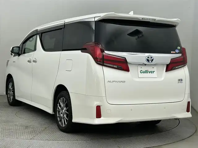 トヨタ アルファードハイブリット SR Cパッケージ 道央・札幌 2021(令3)年 0.9万km ホワイトパールクリスタルシャイン ・４WD/・ディスプレイオーディオ/　BT/USB/Miracast/・ナビTVキット/・バックカメラ/・フリップダウンモニター/・デジタルインナーミラー/・ビルトインETC/・トヨタセーフティセンス/・レーダークルーズコントロール/・レーンキープアシスト/・クリアランスソナー/・オートハイビーム/・BSM/・RSA/・PKSB/・両側パワースライドドア/・パワーバックドア/・レザーシート/・パワーシート/・エア/シートヒーター/・2列目エグゼクティブシート/・LEDヘッドライト/・フォグライト/・オートライト/・プッシュスタート/・スマートキー/・純正フロアマット/・ドアバイザー