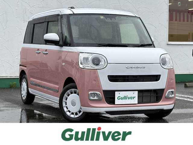ダイハツ ムーヴ キャンバス ストライプス G 徳島県 2022(令4)年 1.2万km シャイニングホワイトパール/アプリコットピンクメタリック 純正ナビ　NMZK-W72D/（AM/FM/BT/TV/DISC/iPod）/フルセグテレビ/バックカメラ/純正前後ドライブレコーダー/前席シートヒーター/電動パーキング/両側パワースライドドア/ホットカップホルダー/ブレーキホールド機能/ドアバイザー/純正フロアマット/プッシュスタート/スマートキー/衝突被害軽減システム/LEDヘッドライト