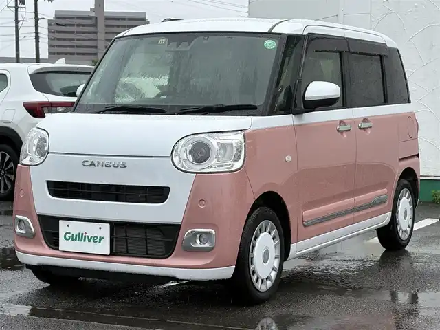 ダイハツ ムーヴ キャンバス ストライプス G 徳島県 2022(令4)年 1.2万km シャイニングホワイトパール/アプリコットピンクメタリック 純正ナビ　NMZK-W72D/（AM/FM/BT/TV/DISC/iPod）/フルセグテレビ/バックカメラ/純正前後ドライブレコーダー/前席シートヒーター/電動パーキング/両側パワースライドドア/ホットカップホルダー/ブレーキホールド機能/ドアバイザー/純正フロアマット/プッシュスタート/スマートキー/衝突被害軽減システム/LEDヘッドライト