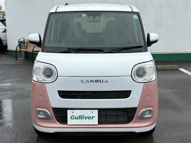 ダイハツ ムーヴ キャンバス ストライプス G 徳島県 2022(令4)年 1.2万km シャイニングホワイトパール/アプリコットピンクメタリック 純正ナビ　NMZK-W72D/（AM/FM/BT/TV/DISC/iPod）/フルセグテレビ/バックカメラ/純正前後ドライブレコーダー/前席シートヒーター/電動パーキング/両側パワースライドドア/ホットカップホルダー/ブレーキホールド機能/ドアバイザー/純正フロアマット/プッシュスタート/スマートキー/衝突被害軽減システム/LEDヘッドライト