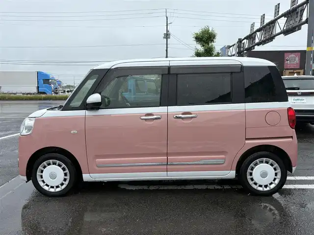 ダイハツ ムーヴ キャンバス ストライプス G 徳島県 2022(令4)年 1.2万km シャイニングホワイトパール/アプリコットピンクメタリック 純正ナビ　NMZK-W72D/（AM/FM/BT/TV/DISC/iPod）/フルセグテレビ/バックカメラ/純正前後ドライブレコーダー/前席シートヒーター/電動パーキング/両側パワースライドドア/ホットカップホルダー/ブレーキホールド機能/ドアバイザー/純正フロアマット/プッシュスタート/スマートキー/衝突被害軽減システム/LEDヘッドライト