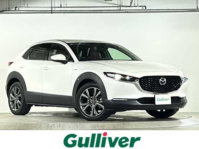 マツダ ＣＸ－３０ XD 100周年特別記念車 広島県 2020(令2)年 2.1万km スノーフレイクホワイトパールマイカ BOSEプレミアムサウンド/純正8.8インチナビ/フルセグTV　Bluetooth　CD/DVD　HDMI/360°ビューモニター/前後ドライブレコーダー/ビルトインETC/衝突軽減ブレーキ/レーダークルーズコントロール/ブラインドスポットモニター/ヘッドアップディスプレイ/前後コーナーセンサー/横滑り防止装置/レザーシート/パワーシート/メモリーシート/シートヒーター/ステアリングヒーター/パワーバックドア/LEDヘッドライト/オートライト/オートマチックハイビーム/電子パーキング/オートホールド