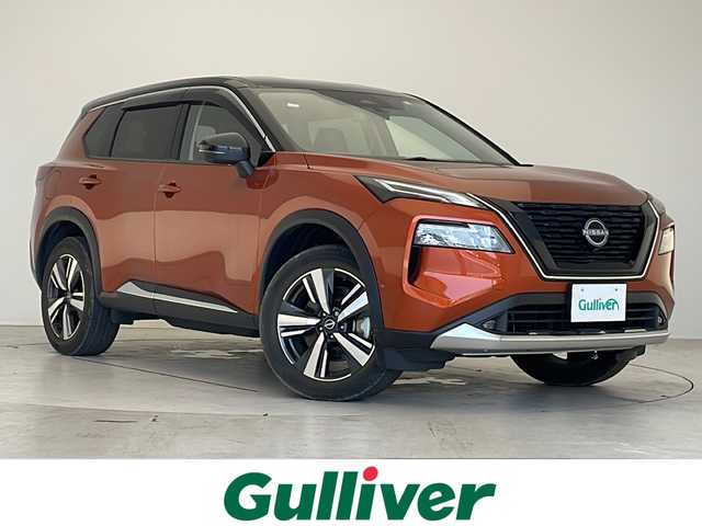 日産 エクストレイル G e－4ORCE 愛知県 2022(令4)年 0.8万km オレンジ プロパイロット/衝突軽減システム/純正１２．４型ディスプレイオーディオ（ナビあり）/全方位カメラ/レーダークルーズコントロール/シートヒーター（全席）/フルセグ/バックカメラ/電動リアゲート/パワーシート/ヘッドアップディスプレイ/コーナーセンサー/純正アルミホイール/ETC2.0/ブラインドスポットモニター/４WD/LEDヘッドライト/インテリジェントミラー/ステアリングヒーター/リアオートエアコン/ダウンヒルアシストコントロール/置くだけ充電器/ドライブレコーダー/ステアリングスイッチ/スマートキー/プッシュスタート
